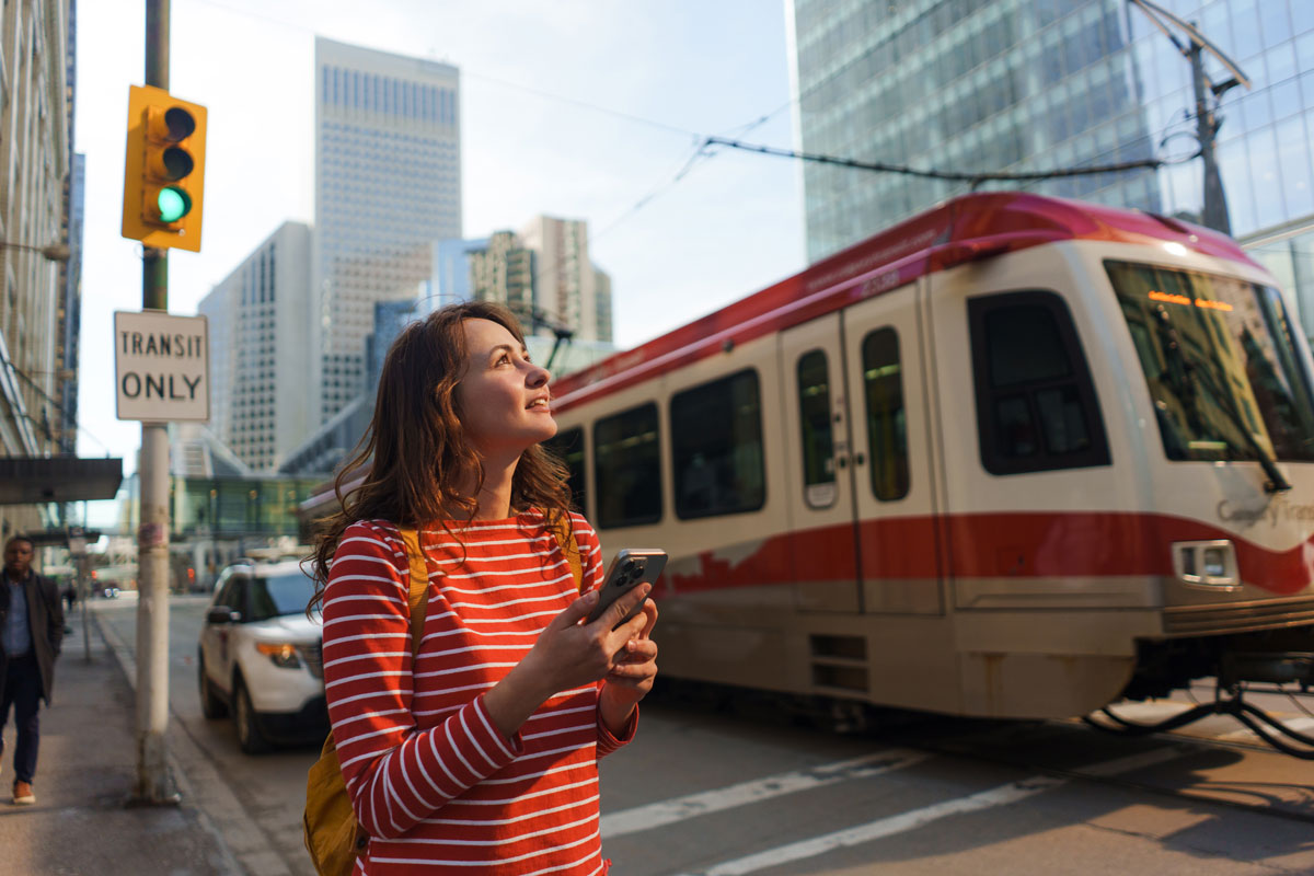 Woman and CTrain passing by